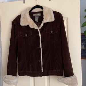 Brown corduroy with cream shearling details. From Roots Jeans size large